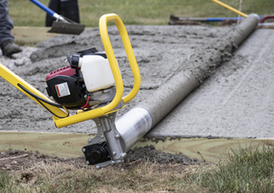 Screeding a concrete slab with the MARSHALLTOWN Spin Screed® roller screed